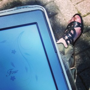 Myself, reading Wind Chime Wedding on my Kindle!